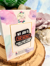 Load image into Gallery viewer, “My Job is Top Secret” Enamel Pin – Funny Black & Red Pin Badge