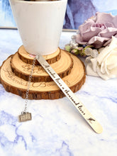 Load image into Gallery viewer, “A Reader Lives a Thousand Lives” Bookmark – Stainless Steel Bookmark with Book Charm