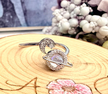 Load image into Gallery viewer, Neptune Adjustable Fidget Spinner Ring – Spinning Planet with Moon & Star