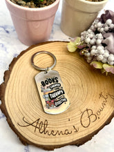 Load image into Gallery viewer, “Books are cheaper than therapy and twice as effective” Keyring
