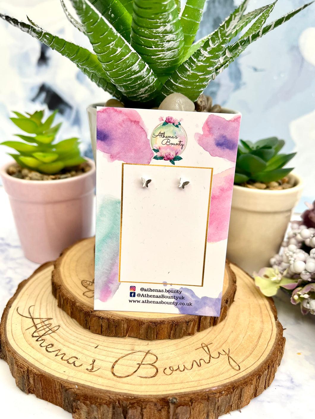 925. Butterfly Studs
