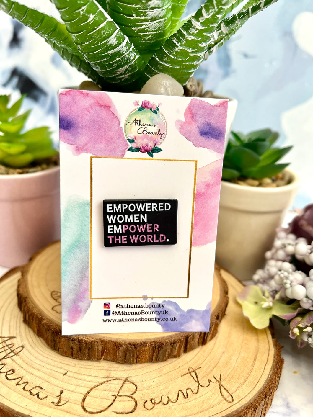 “Empowered women empower the world” Enamel pin