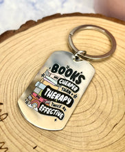 Load image into Gallery viewer, “Books are cheaper than therapy and twice as effective” Keyring
